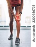 Small photo of Hands, pain and knee injury with a woman in studio holding an injury to her joint while training for fitness. Accident, emergency and anatomy with a female athlete suffering from muscle inflammation