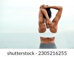 Small photo of Woman, back stretching and outdoor for yoga, workout and training with mockup space. Wellness, nature and ocean with female person doing exercise for health and relax by the sea with stretch arms
