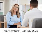 Small photo of Woman, psychiatrist and patient talking during consultation in the clinic or psychologist listen to a man at the office. Mental health, female therapist and conversation or guy for appointment