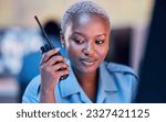 Small photo of Security dispatch, police or woman with walkie talkie for communication to monitor CCTV or surveillance. Emergency radio, crime safety or guard listening to criminal problem, theft or crisis at night