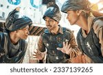 Small photo of Paintball game, strategy planning or team listen to ideas, discussion or battlefield conversation. War mission, tactical survival and group of people talk about conflict, battle or brainstorming plan