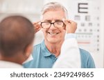 Optometrist  fitting glasses...