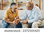Small photo of Men, sofa and support with friends in communication, hand gesture and grief with pain or loneliness. Elderly men, diversity and conversation on mental health or emotional counselling on sad with loss