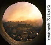 Small photo of Pin hole view of Sighisoara on a foggy morning