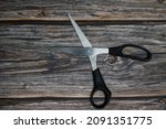 Small photo of Stylish Professional Barber Scissors, Hair Cutting on wood background. Hairdresser salon concept, Hairdressing Set. Haircut accessories. Copy space image, flat lay