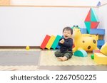 Small photo of Boy playing at nursery school ,daycare , kids cafe