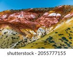 Small photo of Martian landscapes of Kyzyl-Chin. Multicolored mountains near the village of Chagan-Uzun in the Kosh-Agach district of the Altai Republic. Russia, Southern Siberia