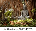 Small photo of Beautiful image of Buddha on a tree. Buddha image. Buddha image in Dhyana posture. Buddha in Dhyana posture at White Temple in Chiang Rai, Thailand