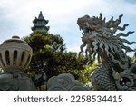 Small photo of Beautiful dragon statue in temple in Monkey Mountains of Da Nang, Vietnam. Religious symbol in Lady Buddha Temple in Da Nang, Vietnam. Beautiful Vietnamese architecture.