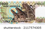 Small photo of Three Toraja houses from Celebs. Portrait from Indonesia 5000 Rupiah 1980 Banknotes.