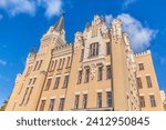 Small photo of Richard's Castle-Lionheart against on blue sky. Richard's Castle is poetic name of house N 15 on Andreevsky Uzviz (descent) in Kyiv. Built in British Gothic style in 19th century.