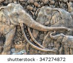 Elephants Stone Sculpture On...