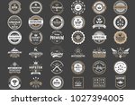 vintage retro vector logo for... | Shutterstock .eps vector #1027394005