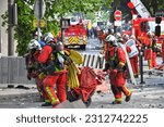 Small photo of Paris,France,1st May 2023.International workers day. Thousands of people protested and celebrated on may-day in Paris. Some protesters turned violent, started fires and destroyed businesses.