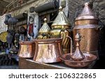 Small photo of Copper and bronze decorative vases, Ironmonger in Kemeralti bazaar, Izmir-Turkey