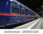 Small photo of COLOGNE, GERMANY - NOVEMBER 8, 2022: Selective blur on the Nightjet logo on an overnight train to austria in Koln Hbf ready for departure. NightJet is a train system of Austrian railways.