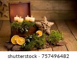 Advent arrangement with candles and orange slices