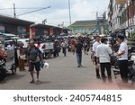 Small photo of Lubuklinggau, Indonesia - December 16, 2023: The Inpres Lubuklinggau market is a hive of activity as sellers and buyers haggle over prices and make purchases