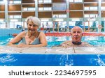 Seniors At A Pool. Portrait Of...