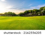 Golf Course At Sunset With...