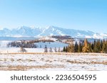 Early morning sunrise in steppes. Snow-covered pasture in the Altai Republic. onset of winter, snow cover.