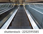 Modern luxury escalator with staircase without people. moving staircase