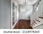 Small photo of entry doorway foyer and stairs