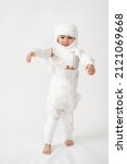 Mummy little boy. Little child pretending mummy. Mummy tissue costume.