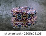 Small photo of A traditional Omani cap in beautiful colors called kumma , which is part of the Omani traditional costume