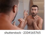 Small photo of Man experimenting self image dissociation