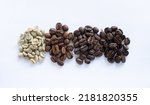 Small photo of Coffee beans on a white background. Raw coffee beans. Light roast, medium roast, dark roast. Roasting at different times and temperatures produces different colored coffee beans.