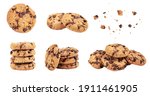 Isolated clipping path of die cut dark chocolate chip cookies piece set stack and crumbs on white background of closeup tasty bakery organic homemade American biscuit sweet dessert