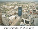 Small photo of Oklahoma City, OK, USA - April 23 2022: BancFirst Tower drone shot ariel view from Devon Tower, downtown of OKC
