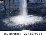 Small photo of cooling water discharge flow for central ac that comes from the oil rig. circulation of seawater from the sea for cooling water and discharged into the sea
