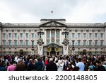 Small photo of London, United Kingdom - September 9 2022: Crowds gather outside Buckingham Palace in tribute to the late Queen Elizabeth II, just ahead of the arrival of King Charles III to the Palace.
