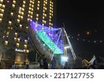 Small photo of jakarta,indonesia-october 2022:Game rides in Indonesia called Kora Kora with the dragon shape in an amusement park