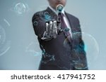 businessman operating virtual hud interface and manipulating elements with robotic hand. Blue holographic screen artificial design concept.