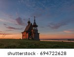 Traditional Russian Orthodox Wooden Church (Chapel) Of St.Nicholas On The Top Of Hill In The Vershinino Village At Sunrise. North Of Russia, Kenozero Lake,Kenozersky National Park, Arkhangelsk Region