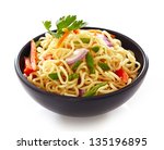 bowl of noodles with vegetables isolated on white