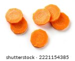 fresh raw carrot slices isolated on white background, top view