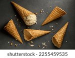 ice cream waffle cones on grey table, top view