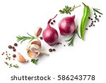 Diagonal composition of red onions, garlic and various spices isolated on white background, top view