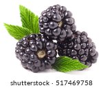 three blackberry with leaf isolated on a white background closeup