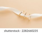 Wedding ring photography is an important part of a wedding photoshoot, capturing the elegance and significance of a couple's love and commitment. These close-up shots highlight the intricate details o