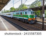 Small photo of Sopot, Poland - September 7 2022: Train station in Sopot. Passenger train intercity arriving at train station. Old electric locomotive PKP class EP07