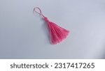 Small photo of pink tassel to complement the craft. can be made to complement earrings, necklaces, bracelets, and other handicraft complements