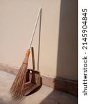 Broomstick and wastebasket from ...