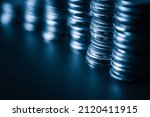 Small photo of Pile of gold coins money stack in finance treasury deposit bank account saving . Concept of corporate business economy and financial growth by investment in valuable asset to gain cash revenue .
