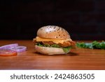 Small photo of crispy Chicken burger with Dynamite sauce