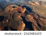 Amazing panoramic landscape of volcano craters in Timanfaya national park. Popular touristic attraction in Lanzarote island, Canary islands, Spain